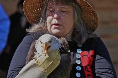 Kim Relcalma-Clutsei, member of the Qualicum Band with eagle