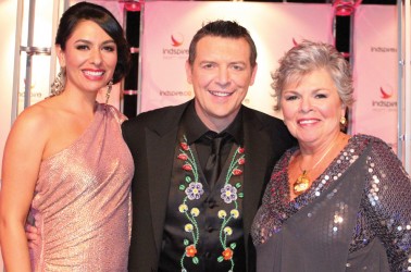 Carmen Moore (left) and Theo Fleury, with CEO Roberta Jamieson