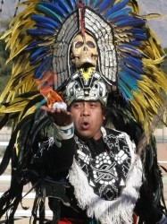 Luis Salinas, from the Aztecs, performs in tribal dress. (Photo: Nancy Smith-Bla