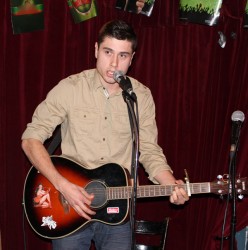 Brendt Thomas Diabo performing at an open-mic in Montreal