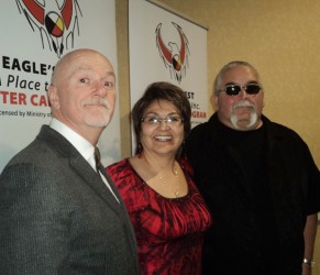 Dr. Brent Angell, Peggy Martin, and Paul Petahtegoose, enjoy a well-attended con