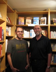 Jean Souï and son Daniel pose in their unique bookstore