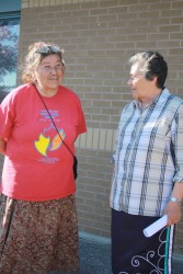Grandmother Josephine Mandamin (left) is welcomed to Nipissing First Nation by C