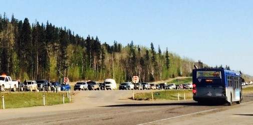 RCMP escorts evacuee convoy through Fort McMurray - Monica Warnica CBC Twitter