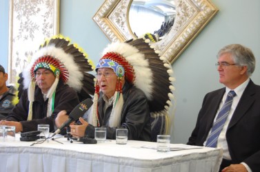 Beaver Lake Cree Nation Chief Al Lameman (centre) speaks flanked by AFN Alberta 