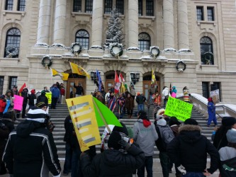 Protestors take to the steps of the Legislature building 
