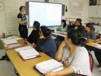 Students at the Saskatchewan Institute of Indian Technologies Regina campus move