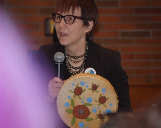 Cindy Blackstock shows a drum gifted to her from Vincent Steinhauer