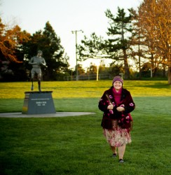 Isabel Okanese next to the monument dedicated to Terry Fox.