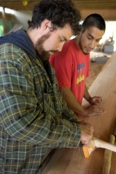 Jaalen Edenshaw and his apprentice Tyler York at the Haida Heritage Centre
