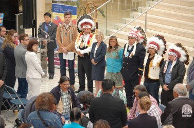 An honor song is performed for the late Chief Rusty Threefingers 