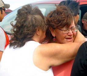 Diane Big Eagle reacts to the discovery of clothing during a Sept. 4 search. The