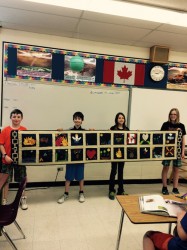 Grade 7 students at Landing Trail school working on a quilting project  