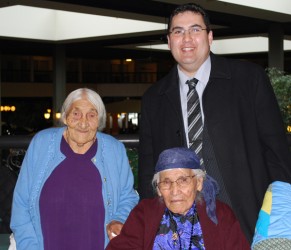 Flora Weenonis and Lucy Whitefish (seated) with Gary Merasty