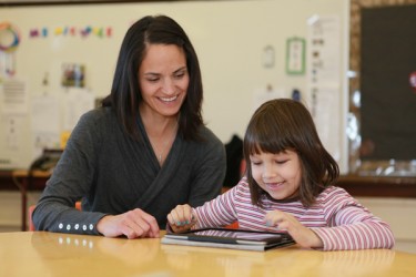 A teacher and a student: Piitoyais Family School celebrates 10th anniversary. 