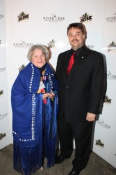 Dr. Maggie Hodgson accepts the Circle of Honour award from Syncrude representati