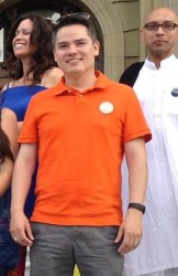 NDP Candidate Aaron Paquette at a rally in the summer at the Alberta Legislature