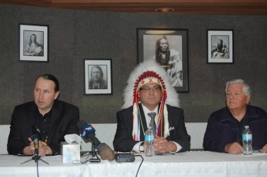 Poundmaker's executive director Brad Cardinal (center)