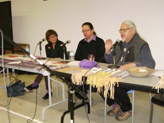 Rick Hill (right) answering questions about wampum, with Alan Corbiere (centre) 